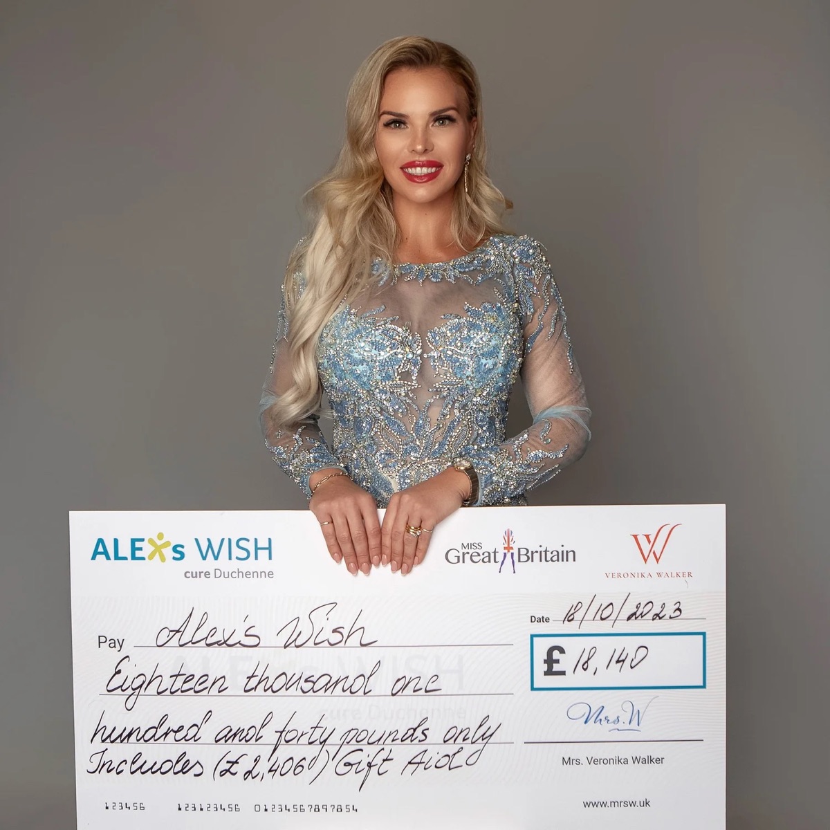 Veronika Walker presenting a fundraising cheque to Alex’s Wish