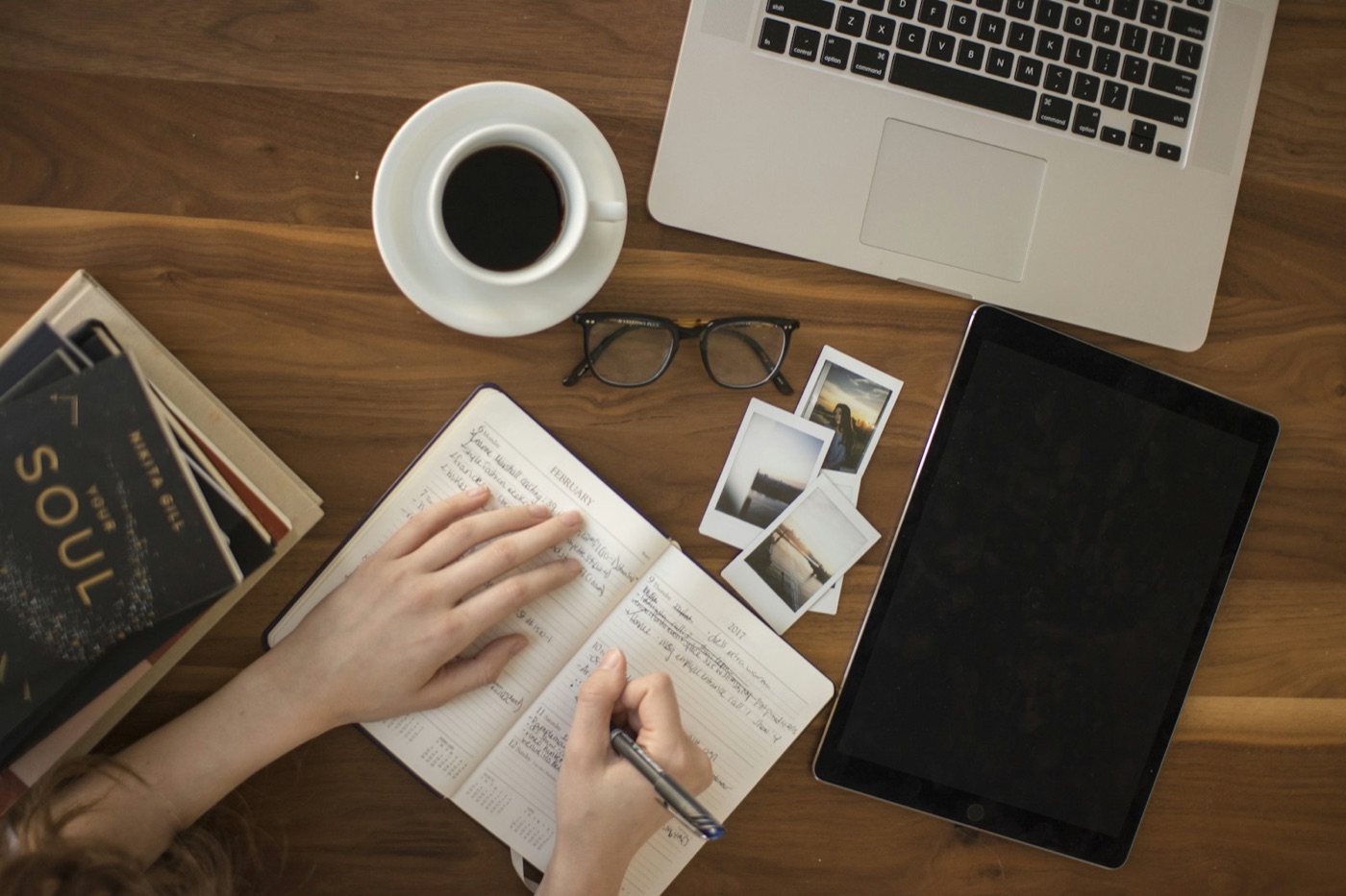 Hand writing in a journal
